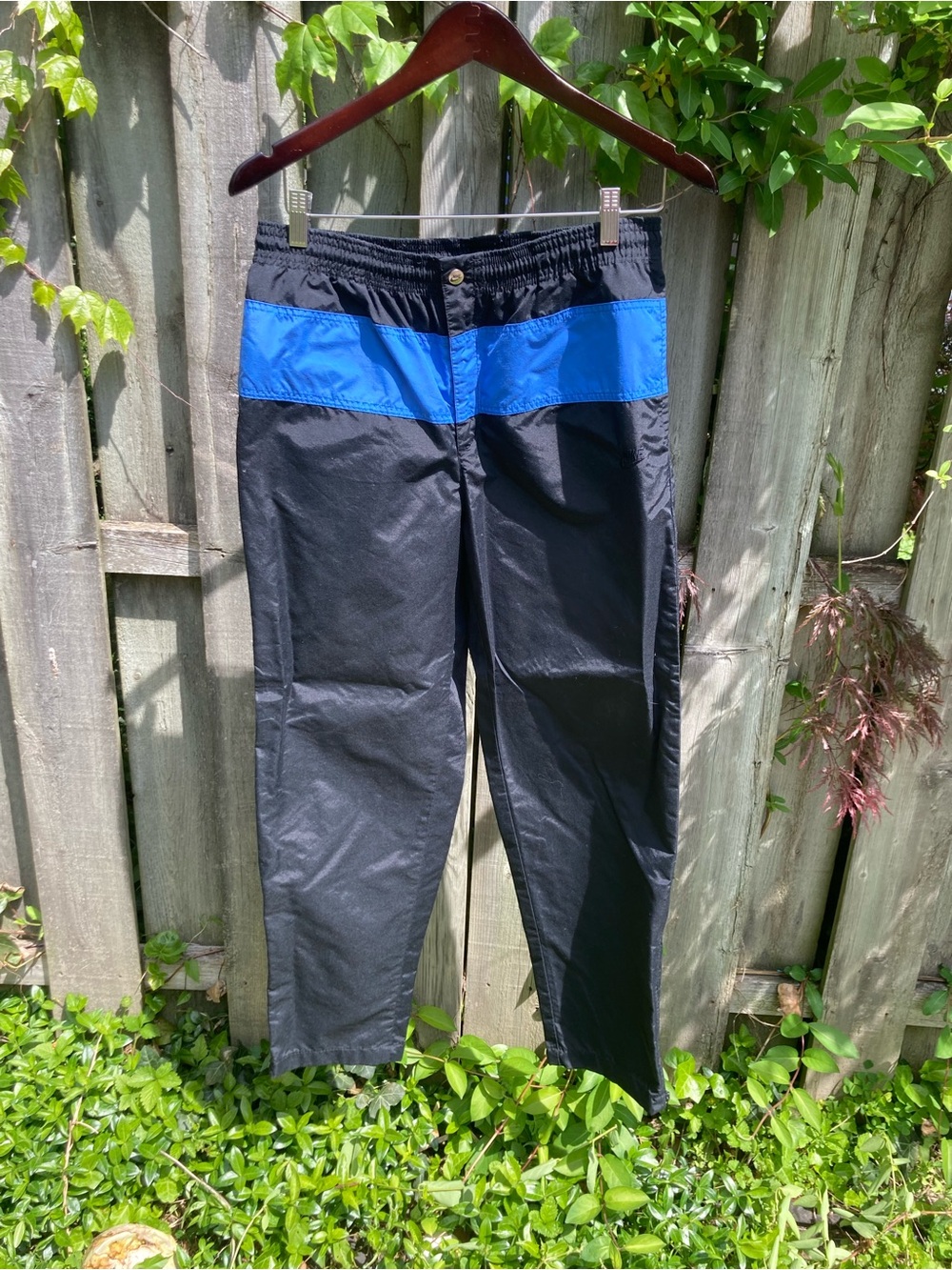 Nike Men's Black Joggers with Blue Waistband Accent